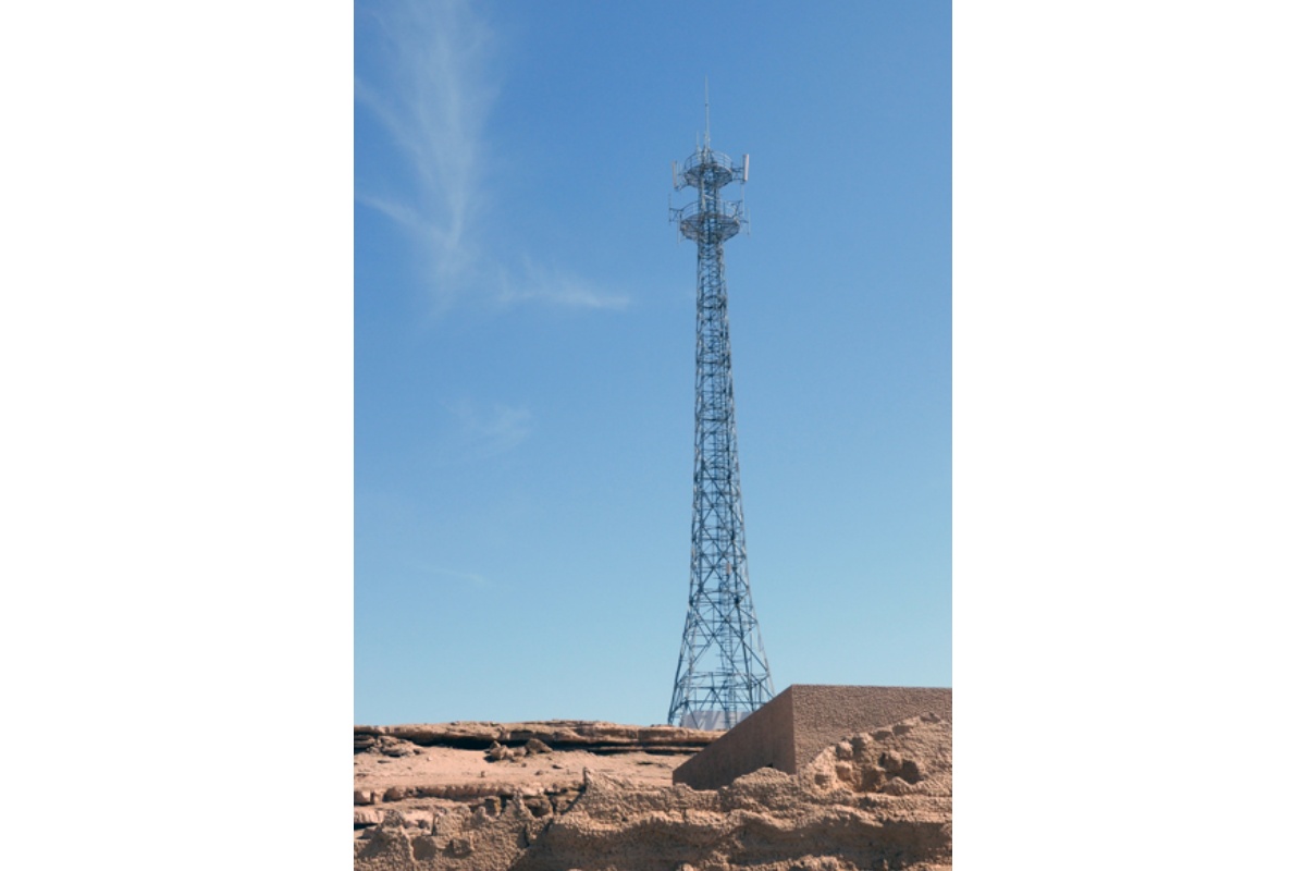 What is the function of a high voltage communication tower?